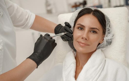 Woman about to get her face injected