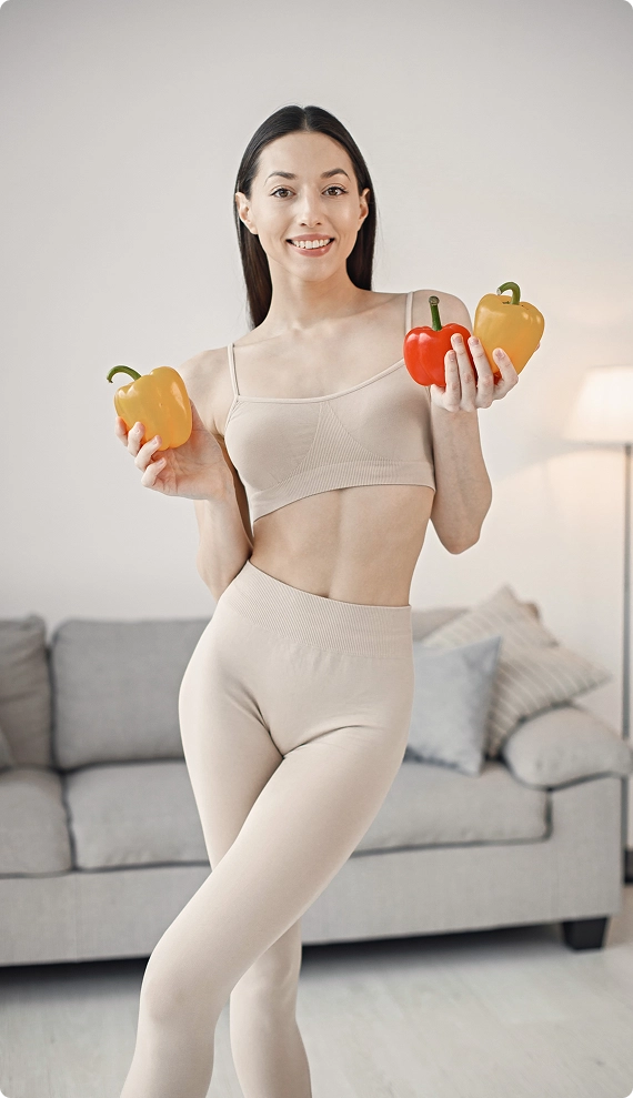 Young-woman-holding-vegetables-img